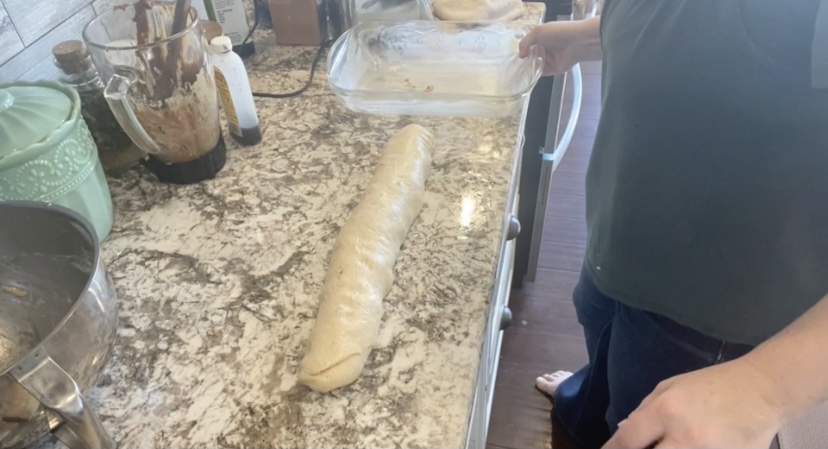 dough rolled up on counter top