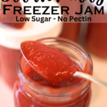 strawberry freezer jam in a jar with a spoon