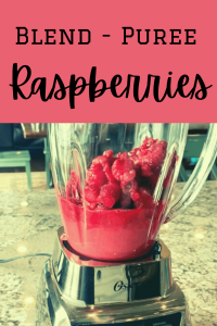 raspberries in blender and text