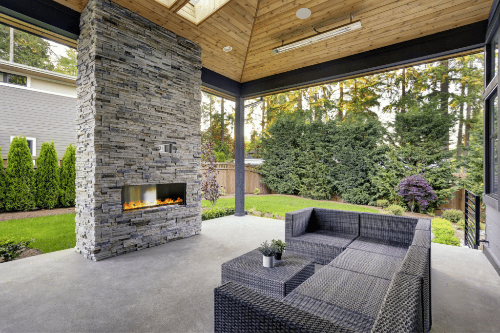 back porch fireplace and couch