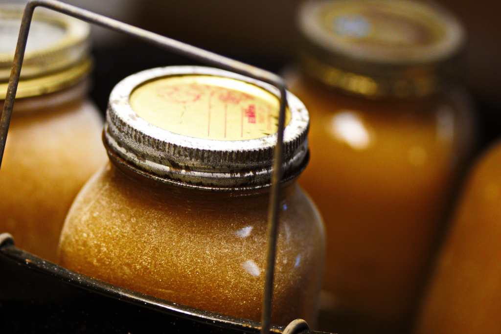 applesauce jars coming out of canner