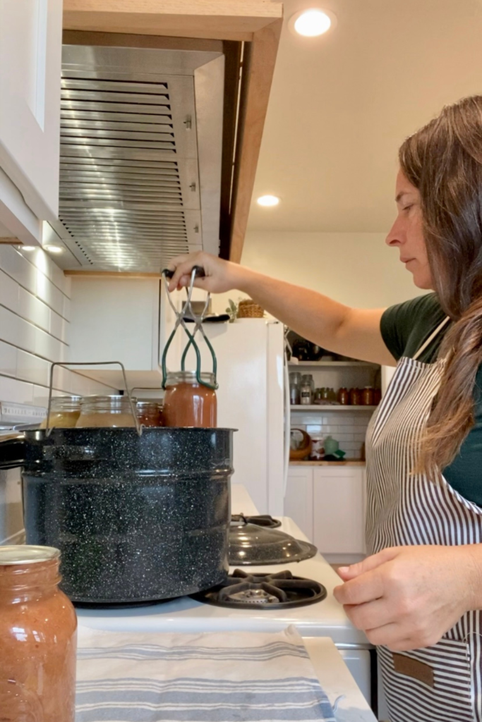 canning apple sauce, removing hot jars from water bath canner