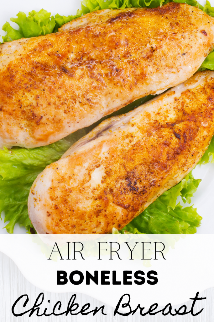 air fryer chicken breast on a bed of lettuce and text