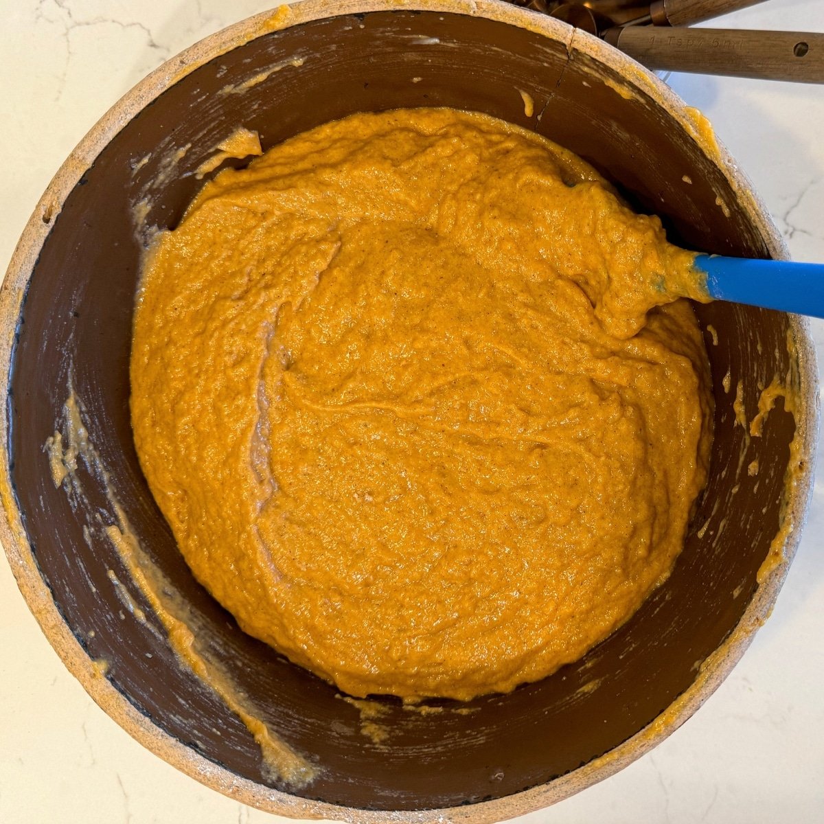 sourdough pumpkin bread dough in mixing bowl