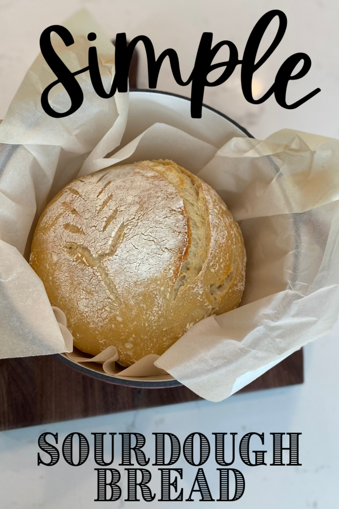 sourdough bread in pot on counter with text
