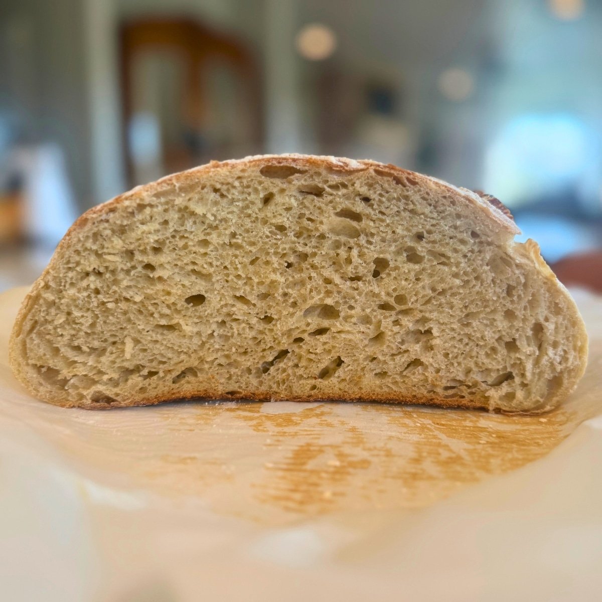 Sourdough bread recipe for beginners high starter method loaf sliced open to show crumb