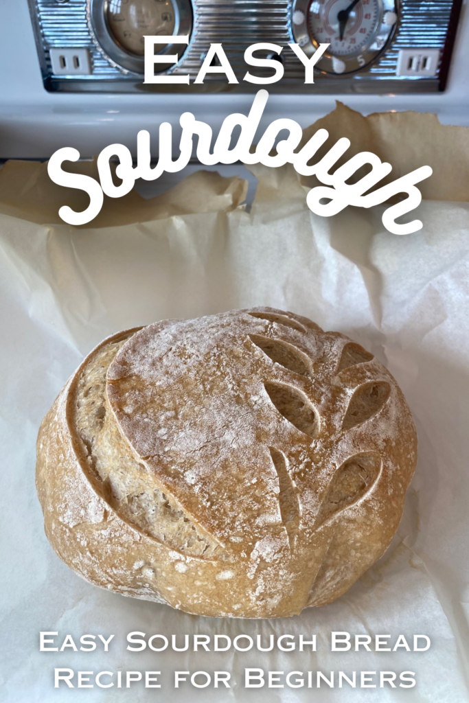 sourdough loaf on parchment paper with text