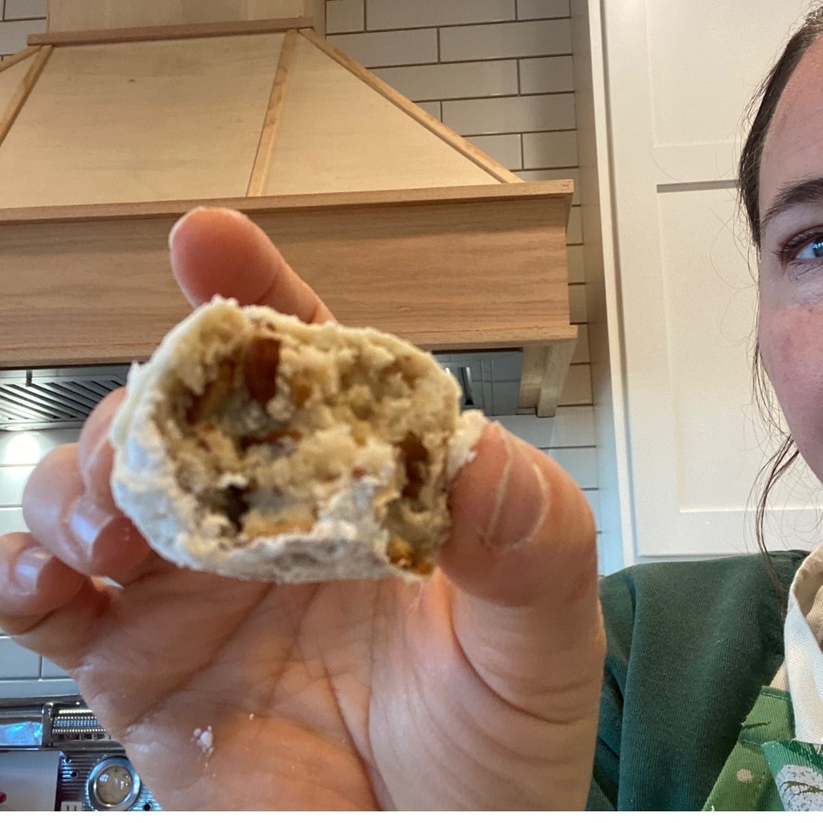 snowball cookie (Mexican wedding cookie) in half showing inside