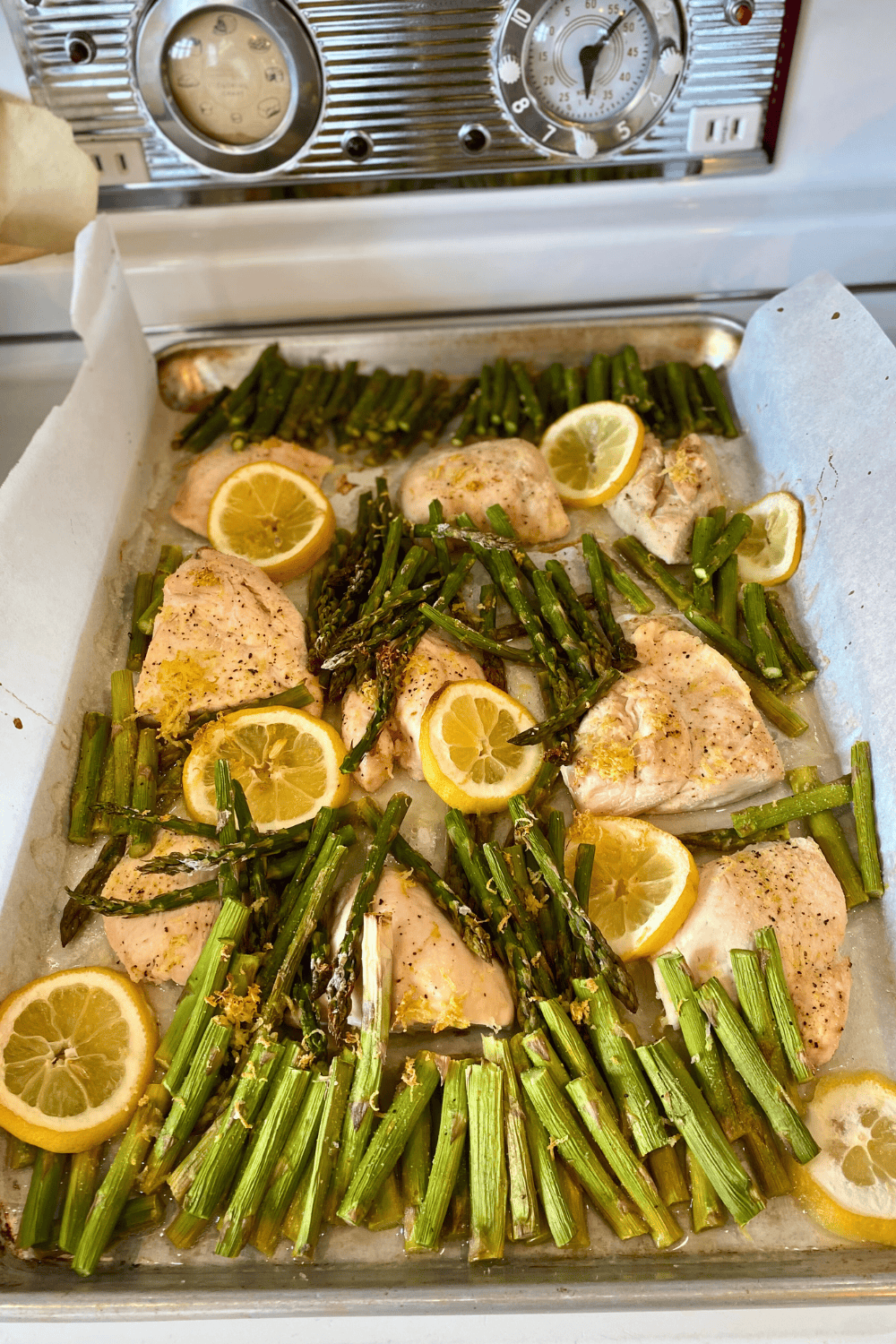 lemon chicken and asparagus sheet pan cooked on stove top