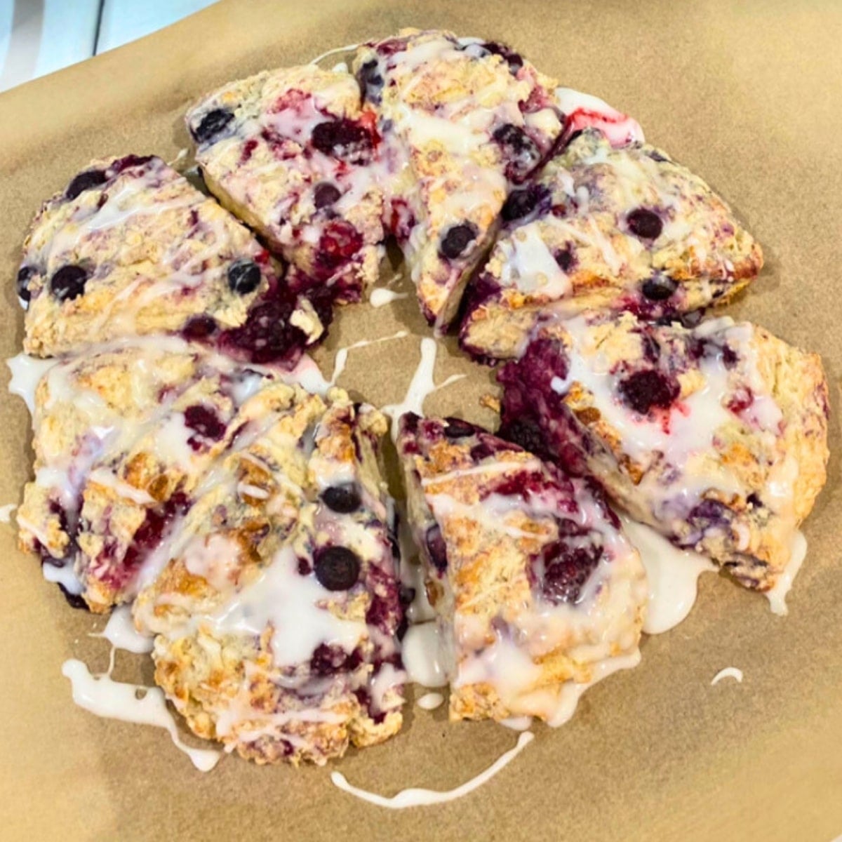 BAKED and glazed berry scones