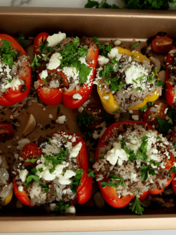 stuffed bell peppers naked in pan by FarmhouseHarvest.net