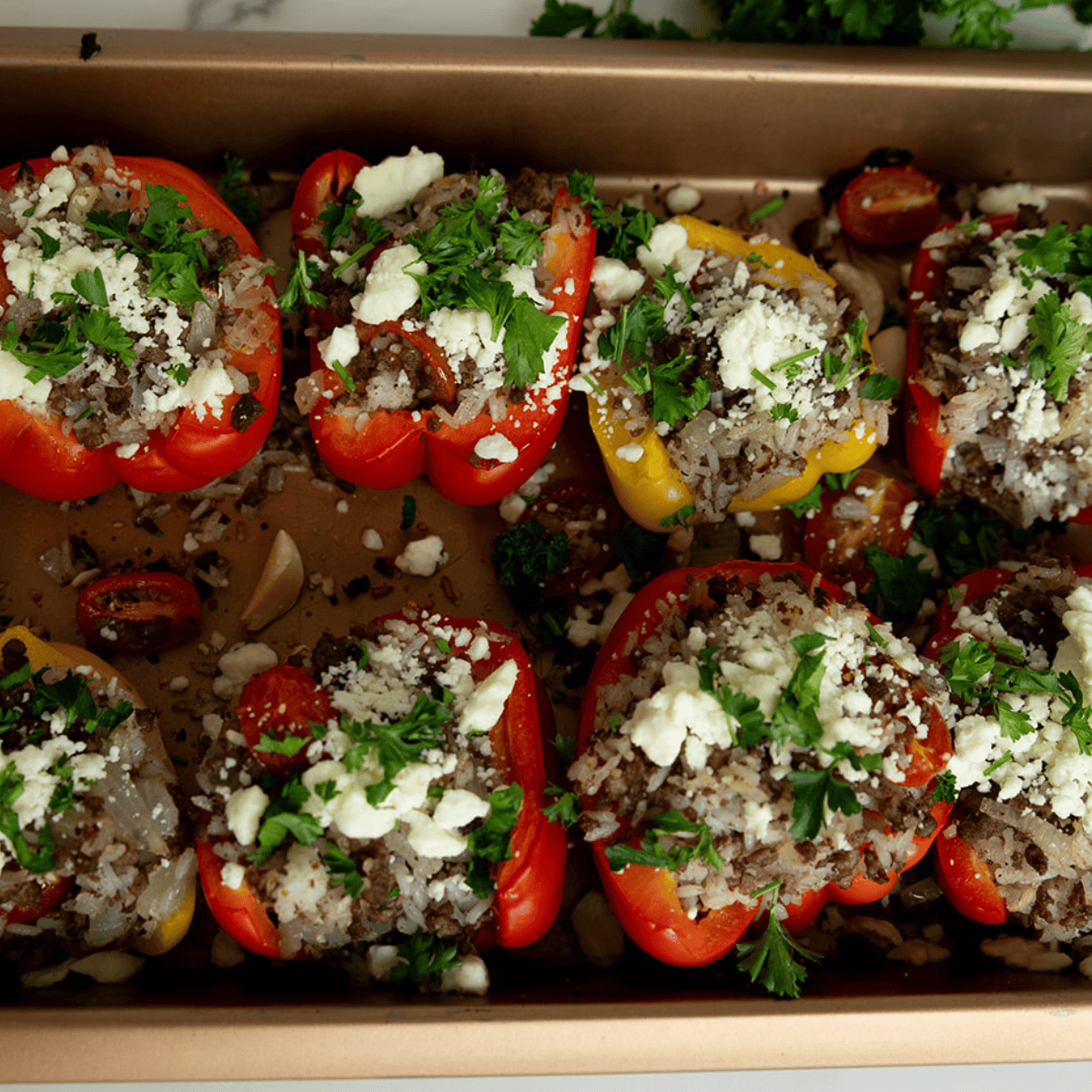 stuffed bell peppers naked in pan by FarmhouseHarvest.net