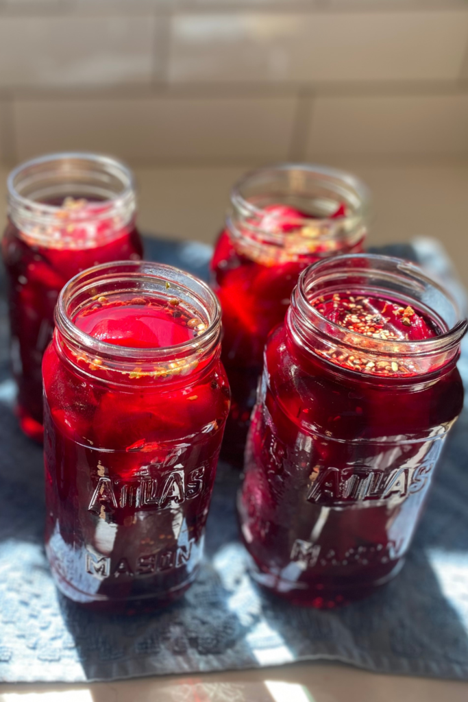 pickled beets recipe on blue hand towel