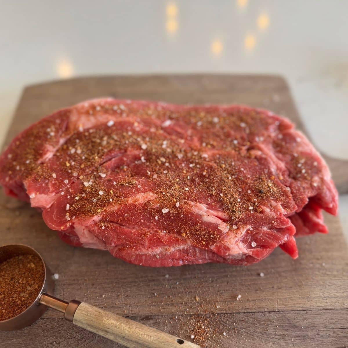 seasoned chuck roast on cutting board