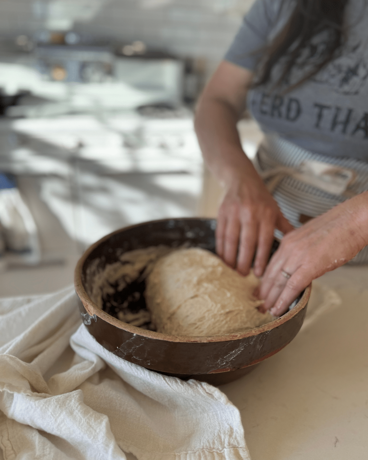 folding sourdough bread dough 2 of 2