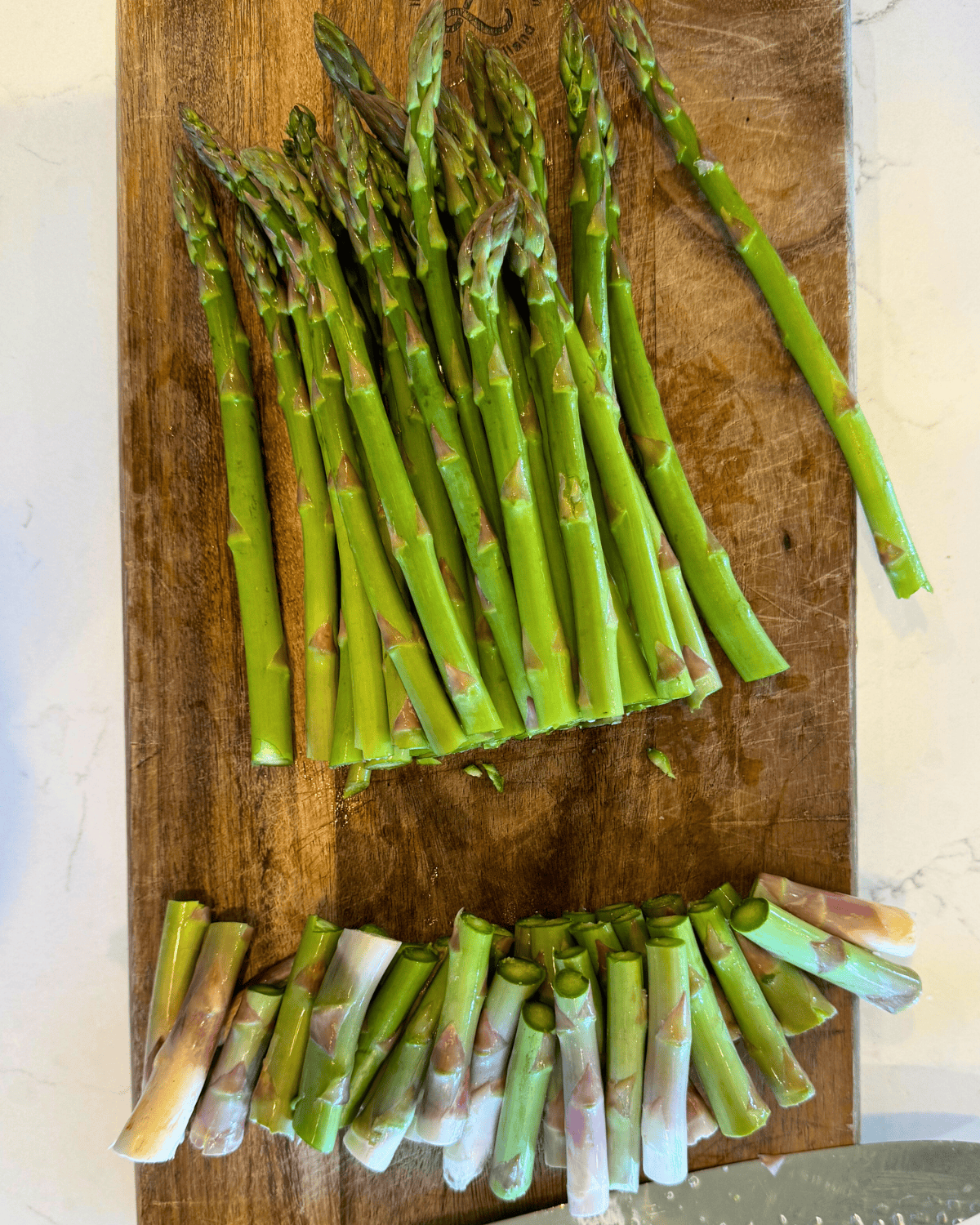 asparagus fresh washed and trimmed on cutting board