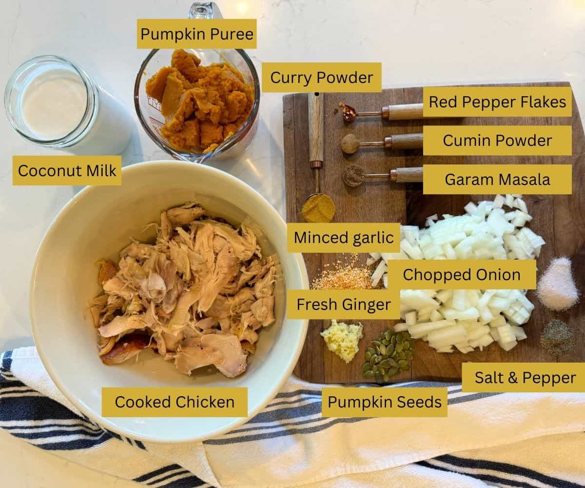 1 pre-cooked rotisserie chicken, shredded
1 can (14.5 oz) coconut milk
1 can (15 oz) pumpkin puree
1 onion, chopped
2 cloves garlic, minced
1 tablespoon curry powder
1 teaspoon ground cumin
½ teaspoon red pepper flakes (adjust to taste)
1 tablespoon grated fresh ginger
1 teaspoon garam masala
Salt and pepper to taste
1 tablespoon vegetable oil