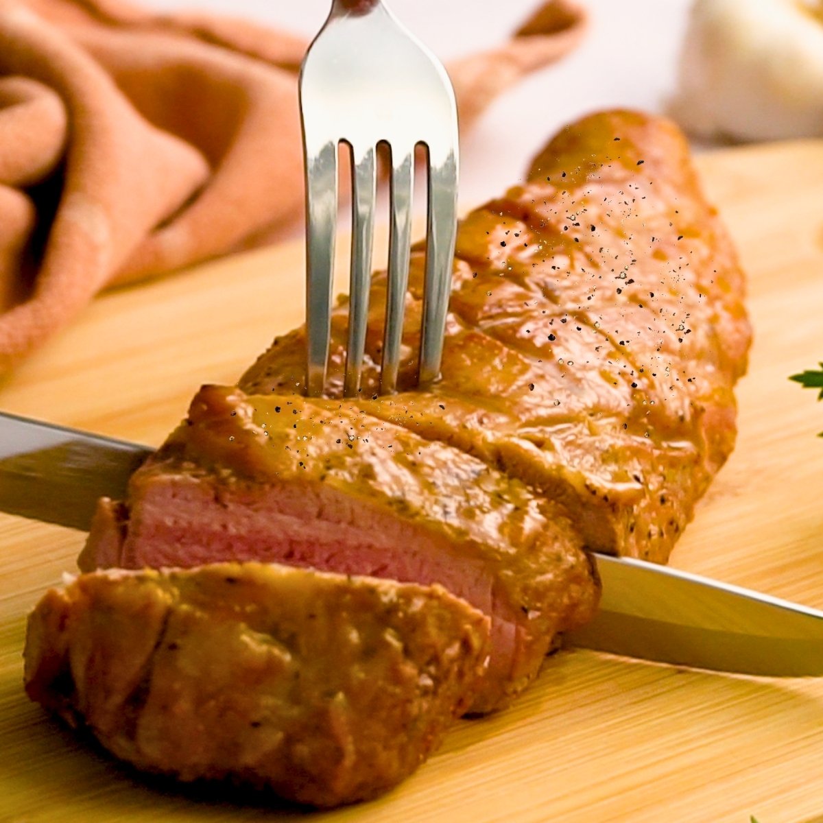 slicing Honey-Dijon Glazed Pork Loin