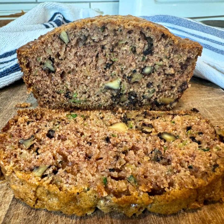 showing texture and crumb inside moist sourdough zucchini bread loaf, sliced