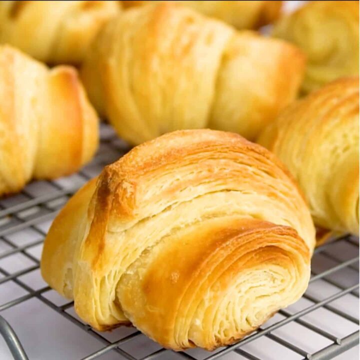 simple croissants cooling on wire rack