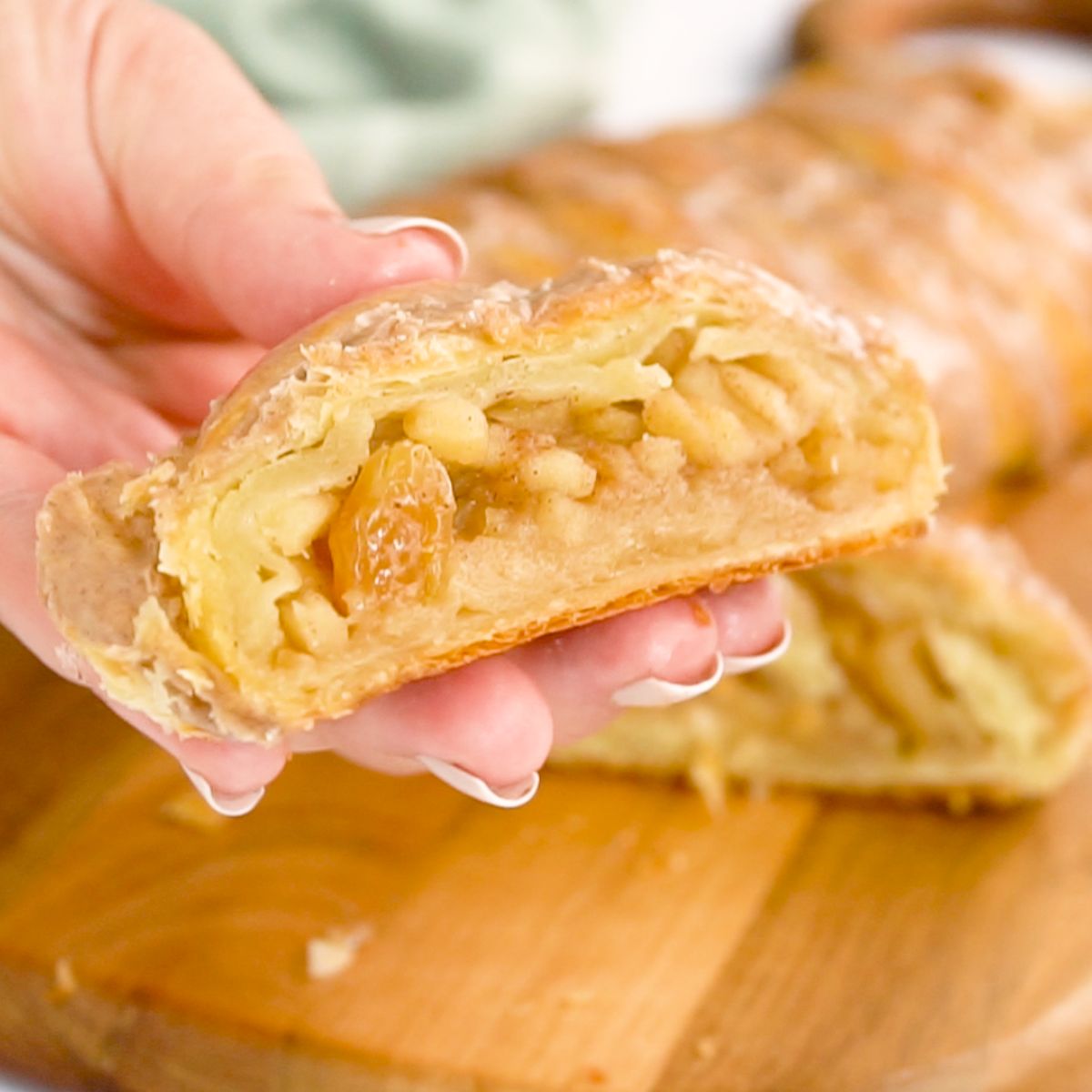 up close slice of apple strudel showing filling