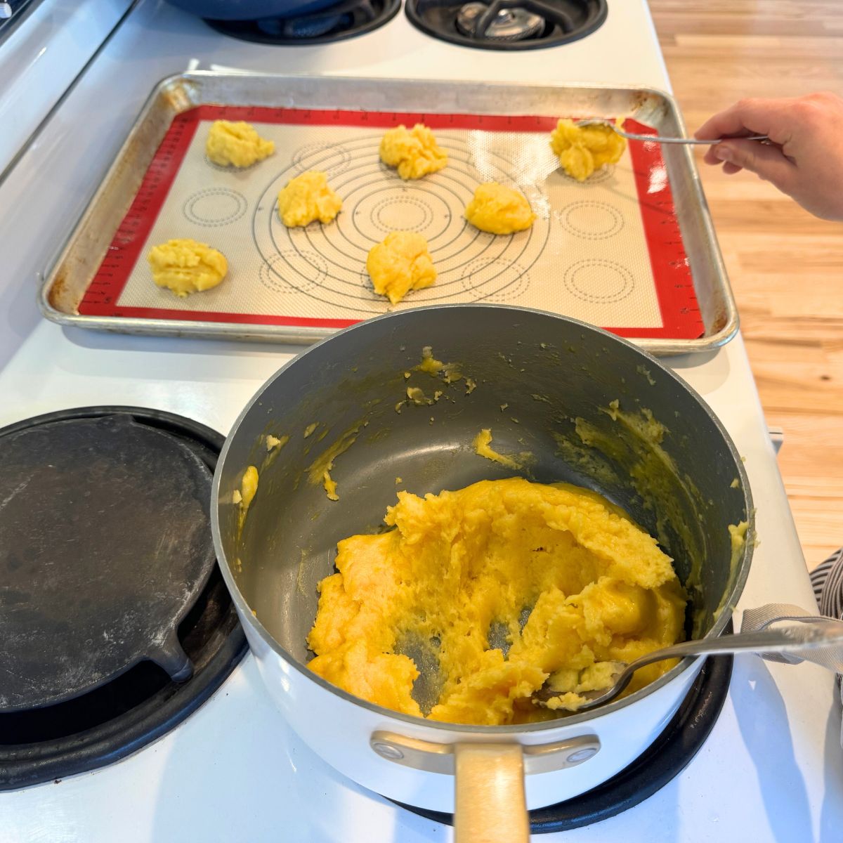 drop 14 cup dough balls onto a prepared baking sheet with parchment paper or a silicone baking matt