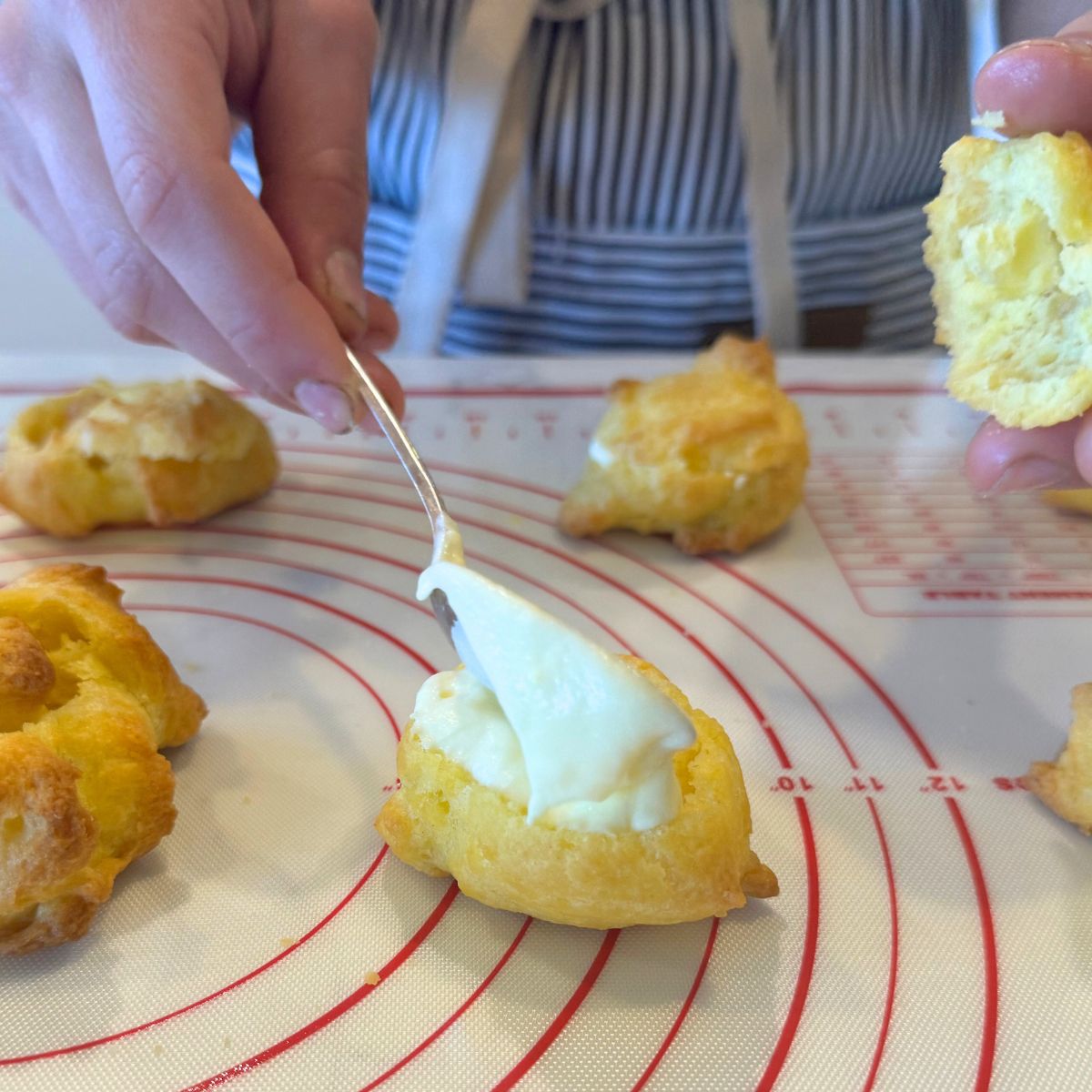 fill hollowed out cream puffs with vanilla cream filling and place cream puff top on top