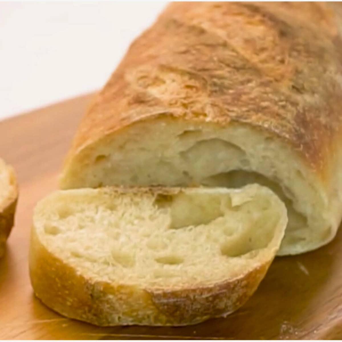 sourdough baguette sliced open to show crumb
