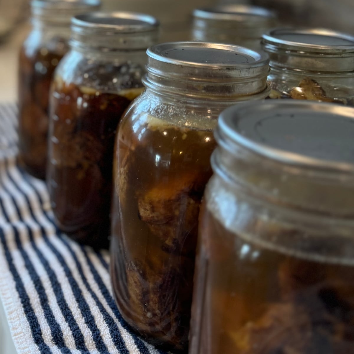 roast beef canned in jars on counter
