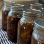 jars of canned roast beef canning recipe with text