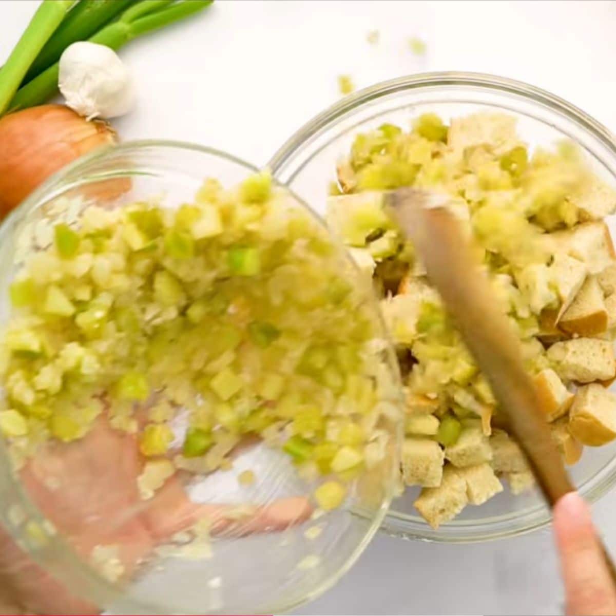 add sautéed onion and celery to bread crumbs