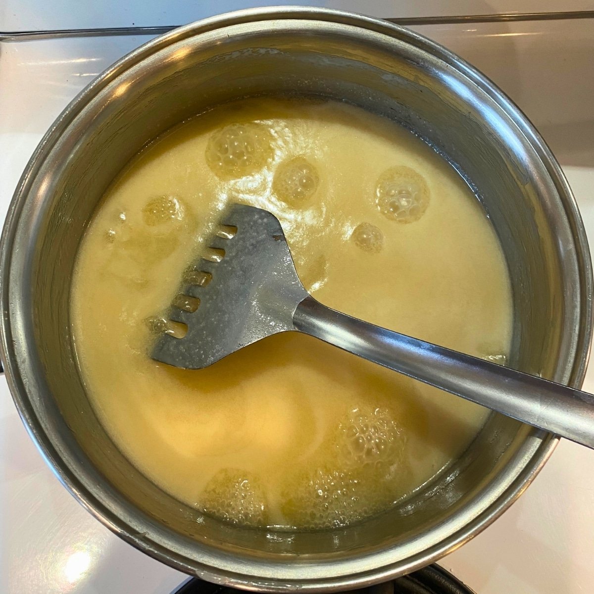 butter, sugar cream and syrup in pot heating up