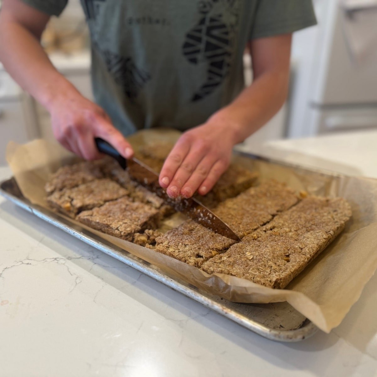 slicing sourdough apple breakfast bars