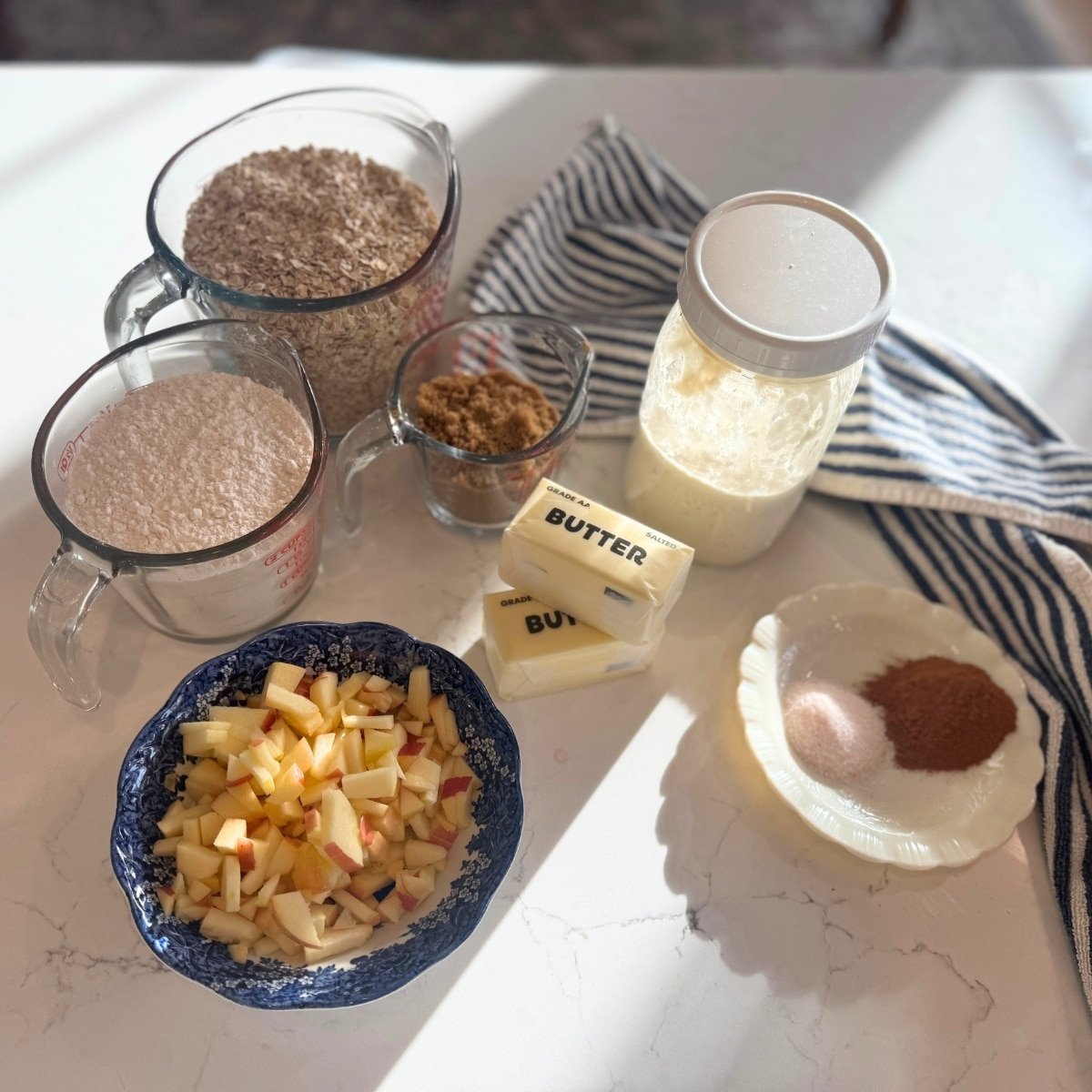 sourdough apple breakfast bar ingredients oats, flour, minced apple, sourdough starter jar, butter, salt cinnamon brown sugar
