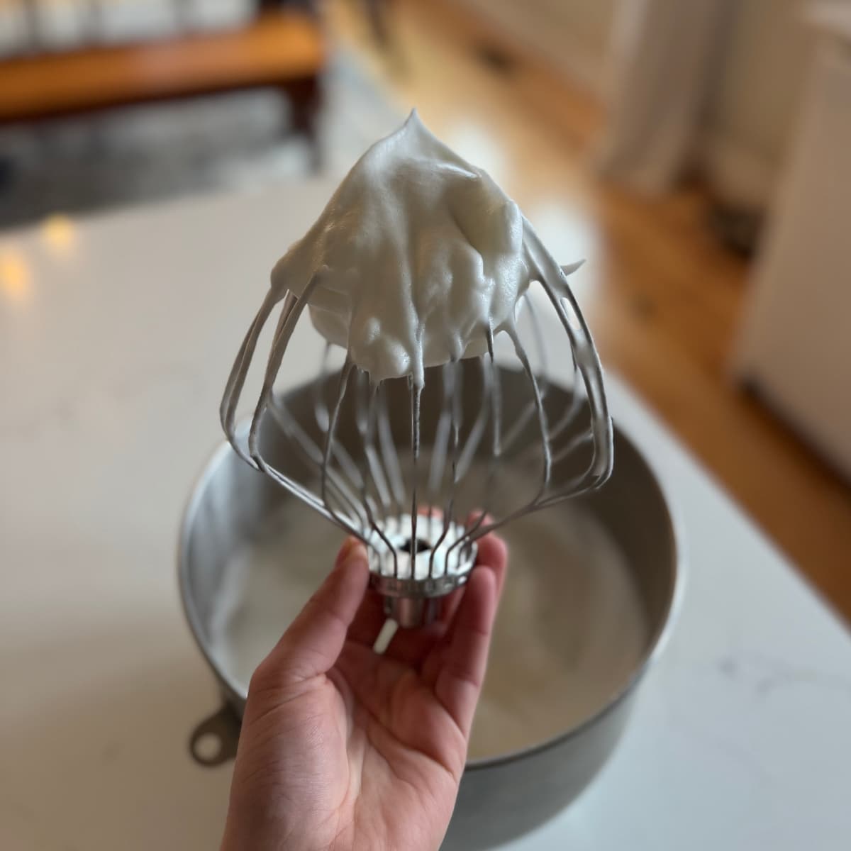 whipping meringue to stiff peaks