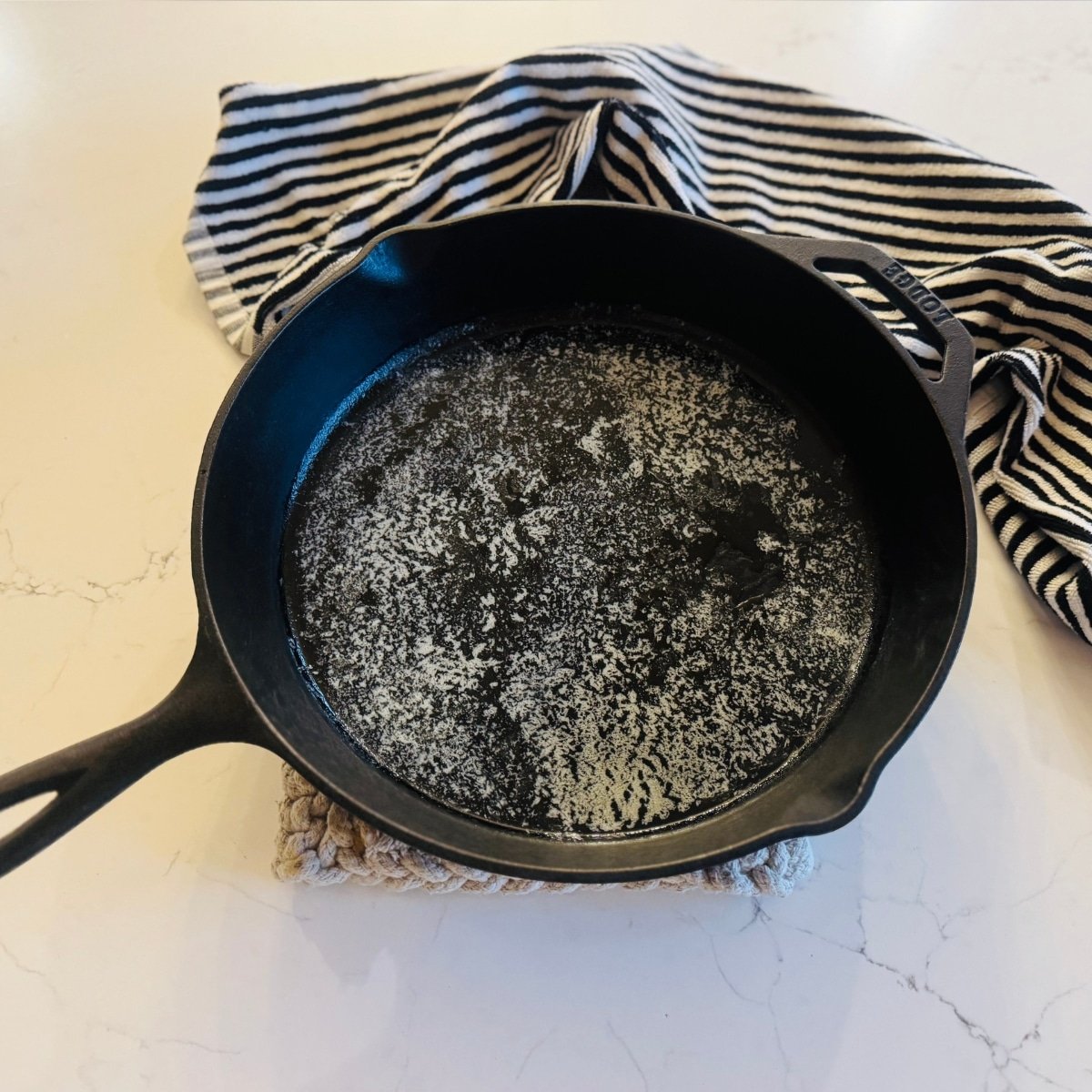 butter melted in a hot cast iron skillet