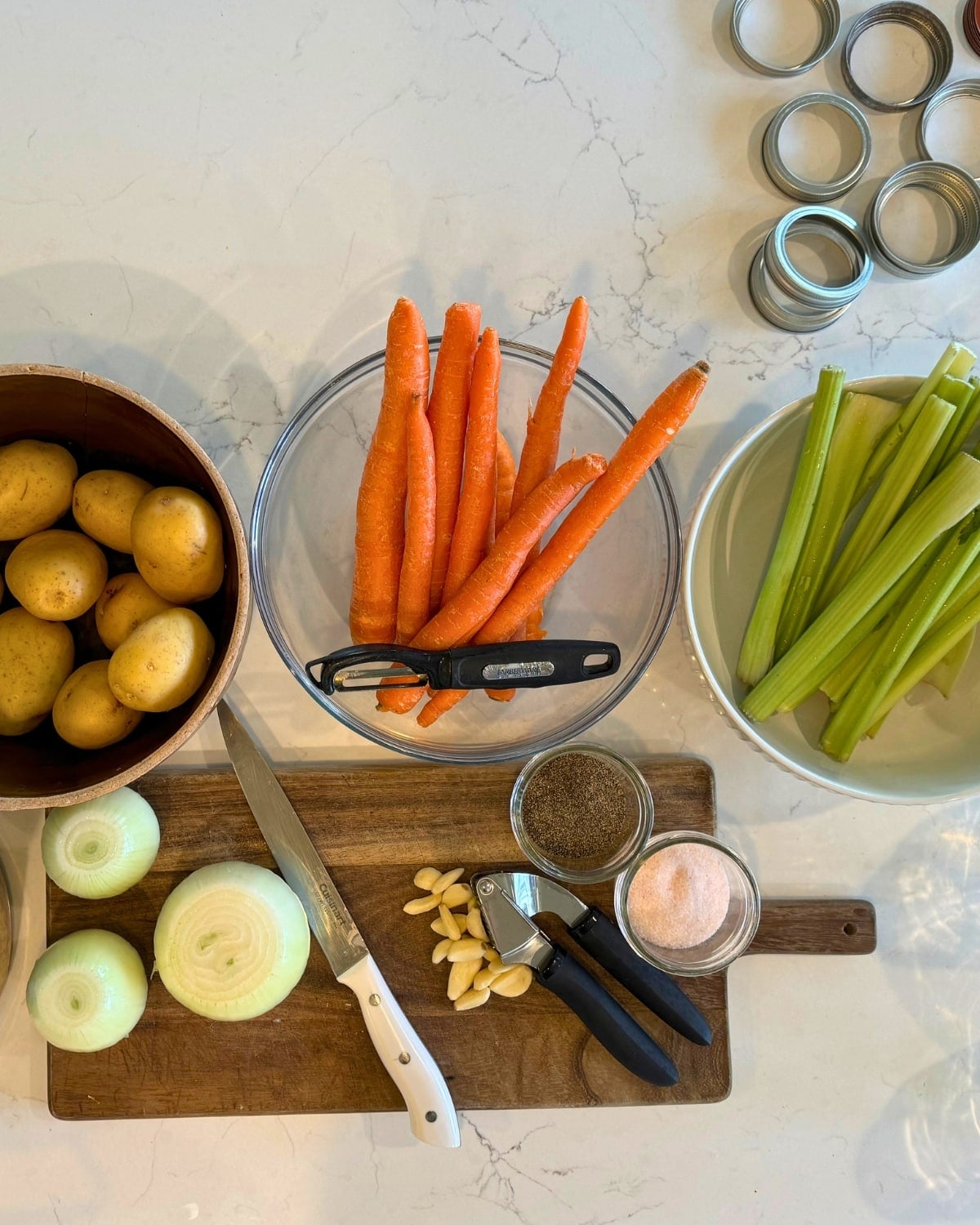 potatoes, cattors, onion, clelery, garlic, salt , pepper jars, lids
