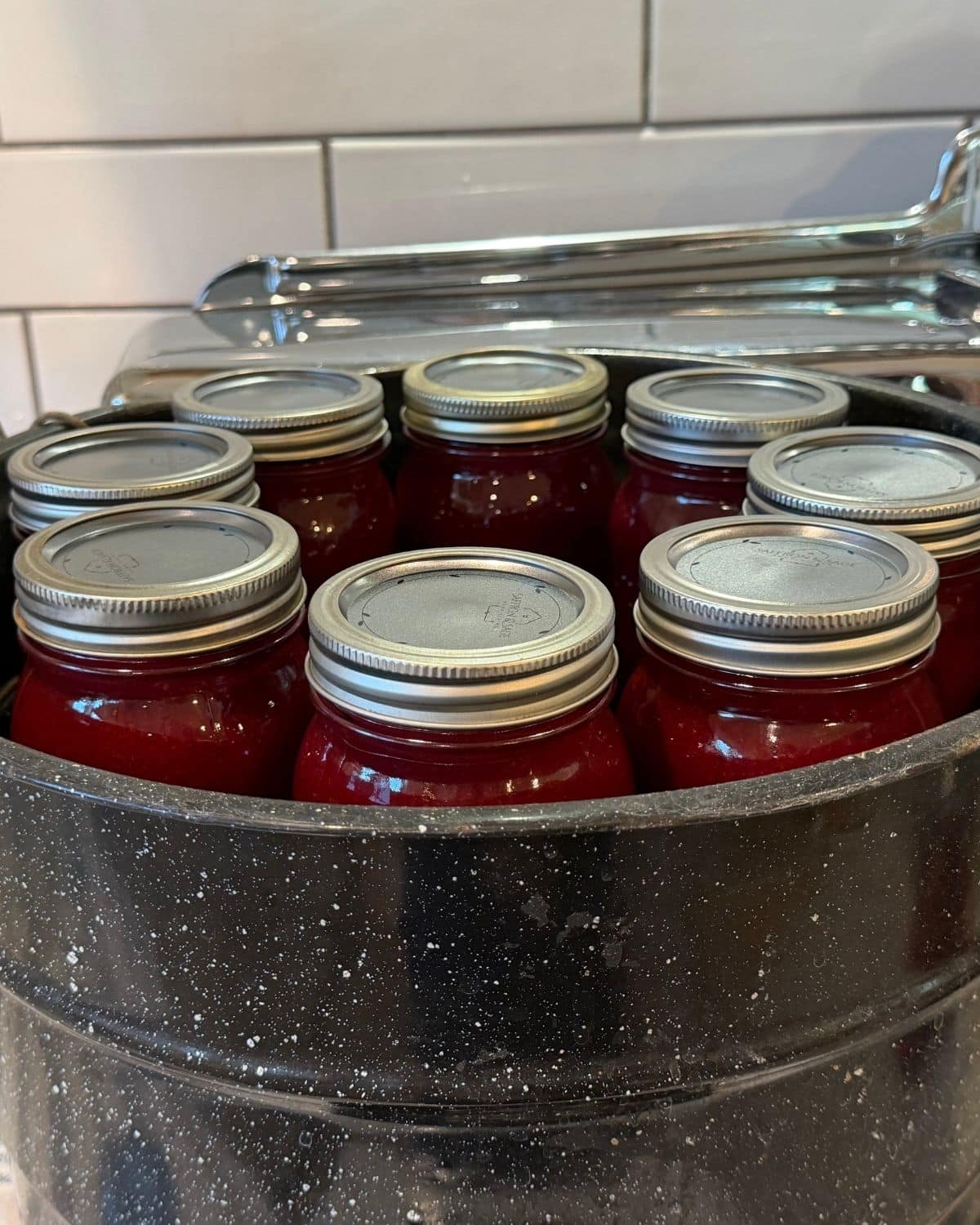plum sauce canneing recipe jars in canner on canner rack