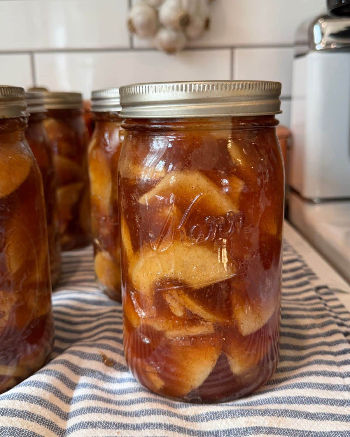 apple pie filling canning recipe in quart jars cooling