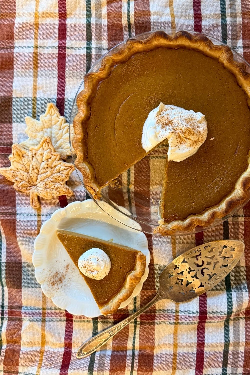 easy pumpkin pie served on plate with whipped cream