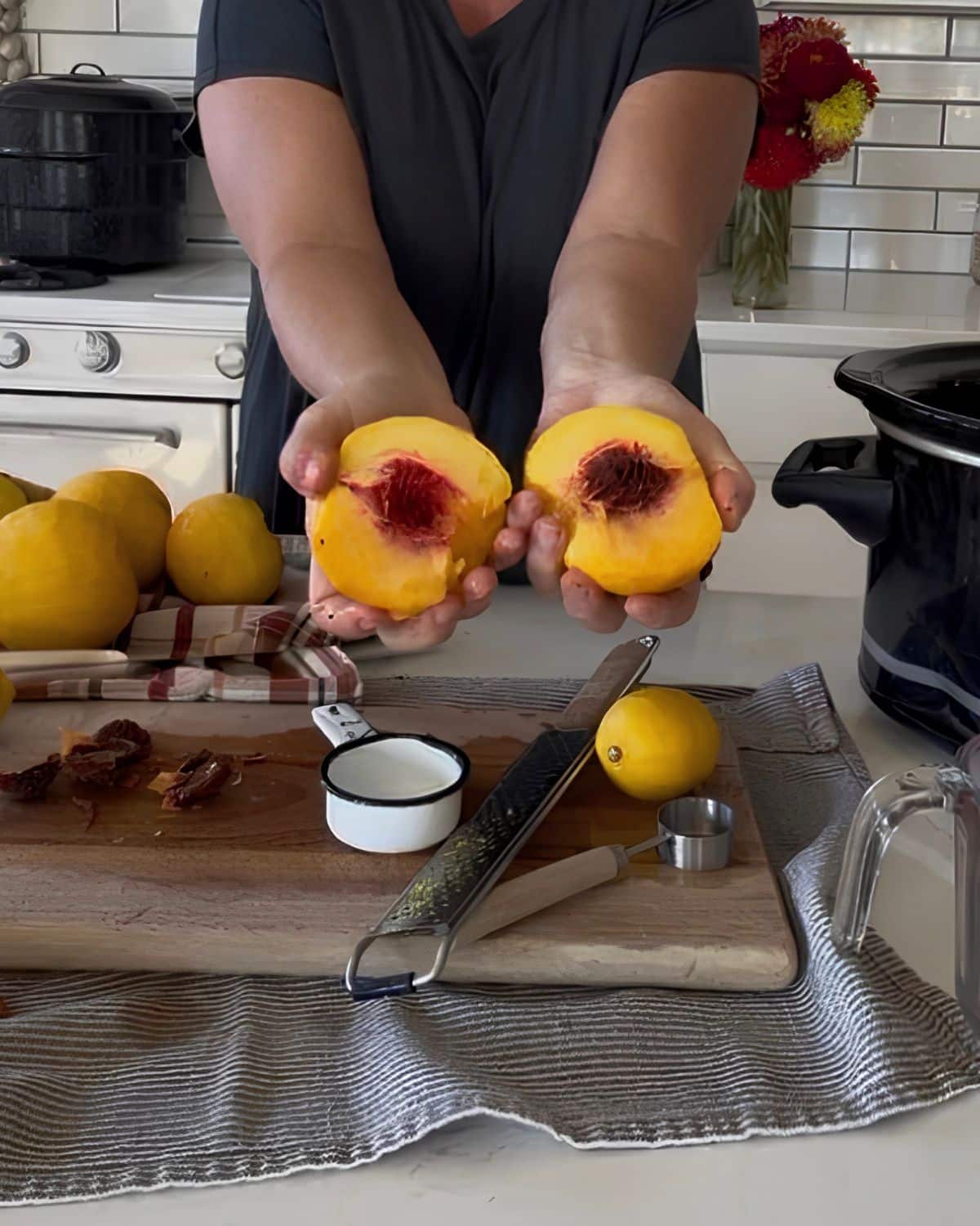 prepping peaches, pealed and removing seeds